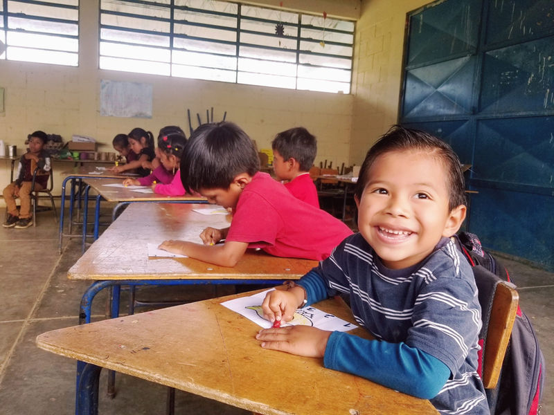 Children eating a nutritious snack in the classroom